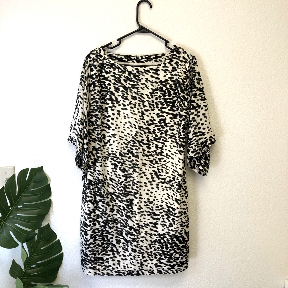 Silk black and white polka dot mini dress